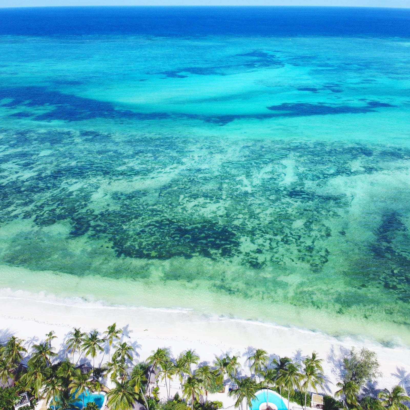 Aerial view of the two Matlai villas and the beach in front, at Michamvi Pingwe