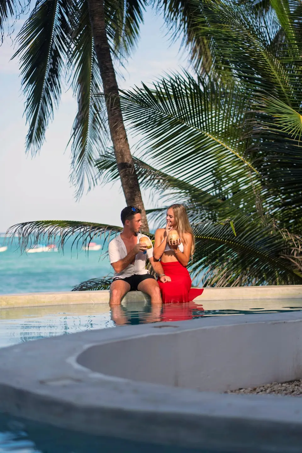Romantic Couple at Pool Edge – Asili House Zanzibar
