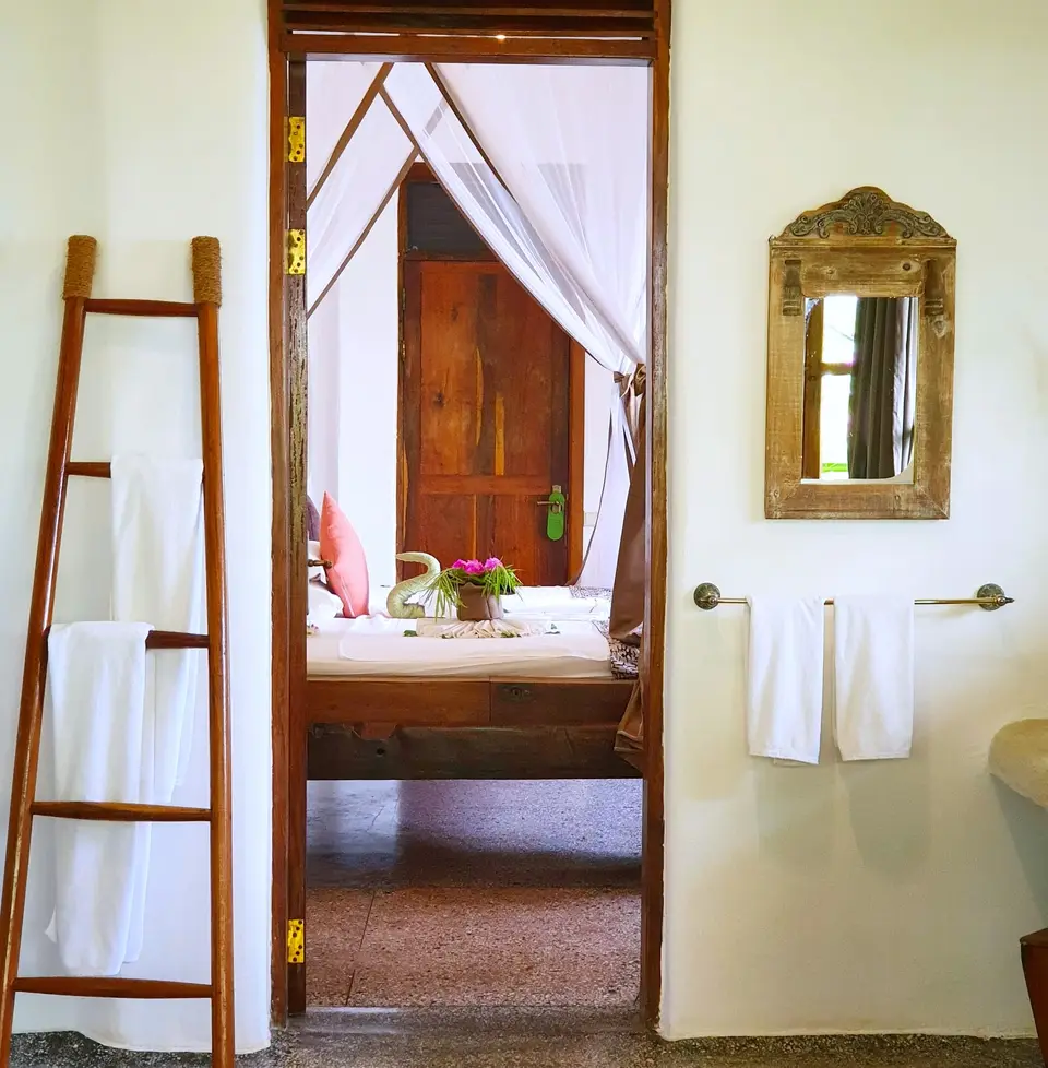 Dunia Room | view from the bathroom into the sleeping room