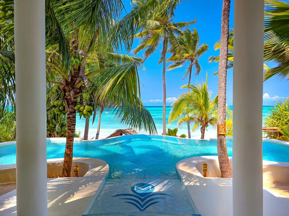 Villa Kidosho | pool view from the sharing lounge to the pool and ocean