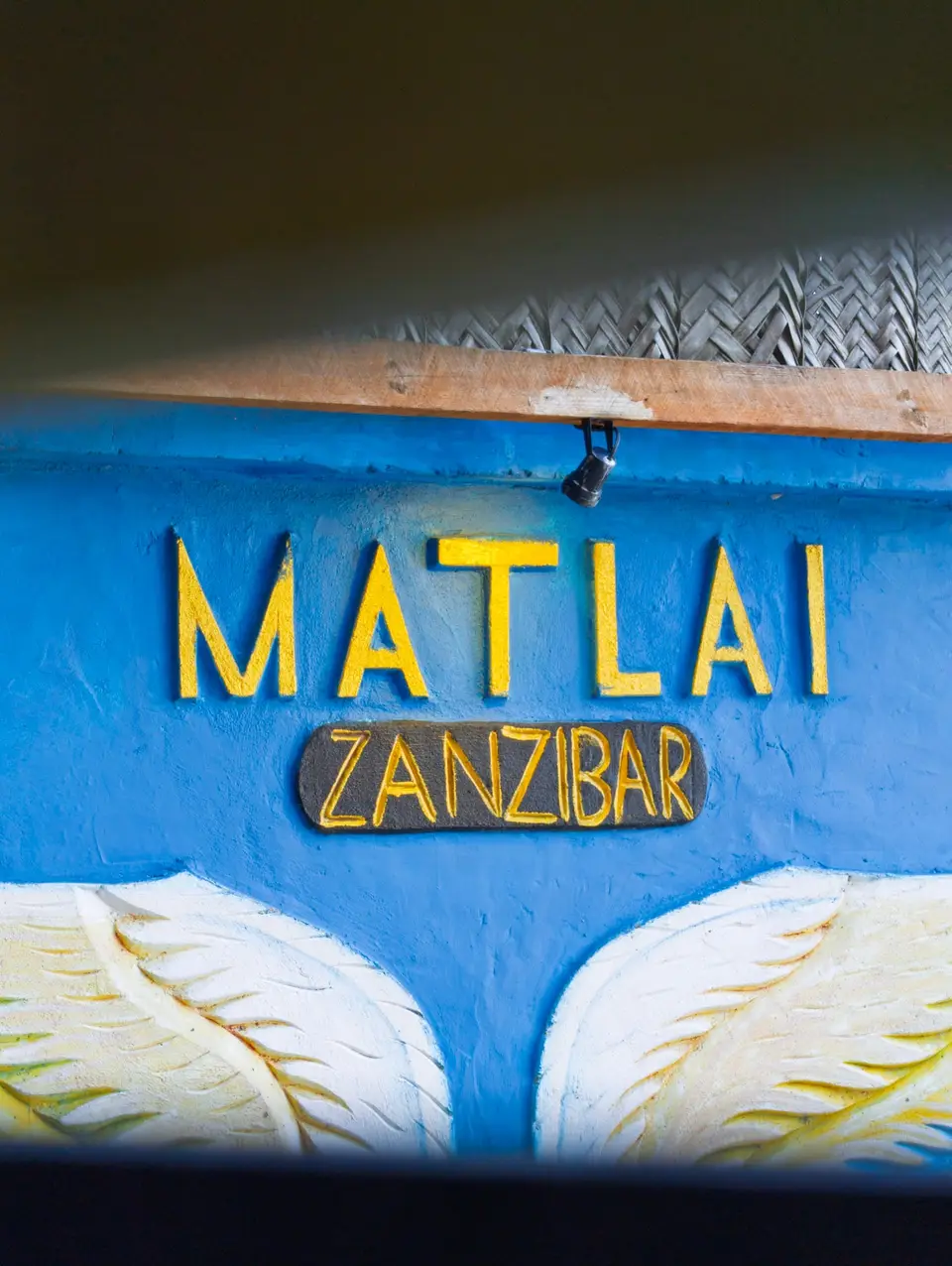 Angel wings cement wall art at Boutique Hotel Matlai Zanzibar, a popular guest photo spot.
