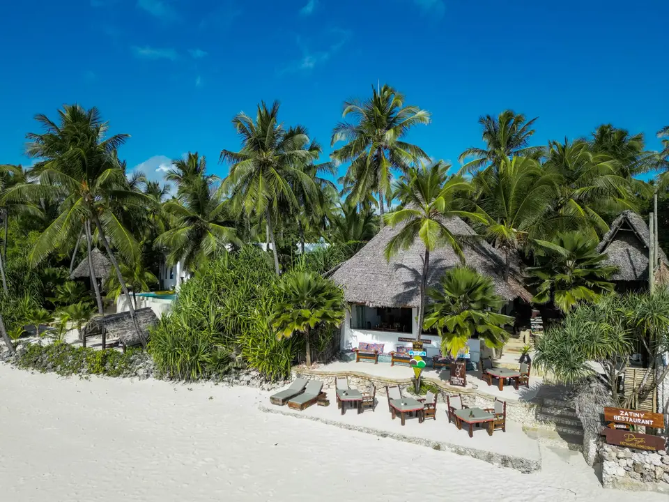 Drone view of Zatiny Restaurant and Beach Bar at Boutique Hotel Matlai Zanzibar from the shoreline.