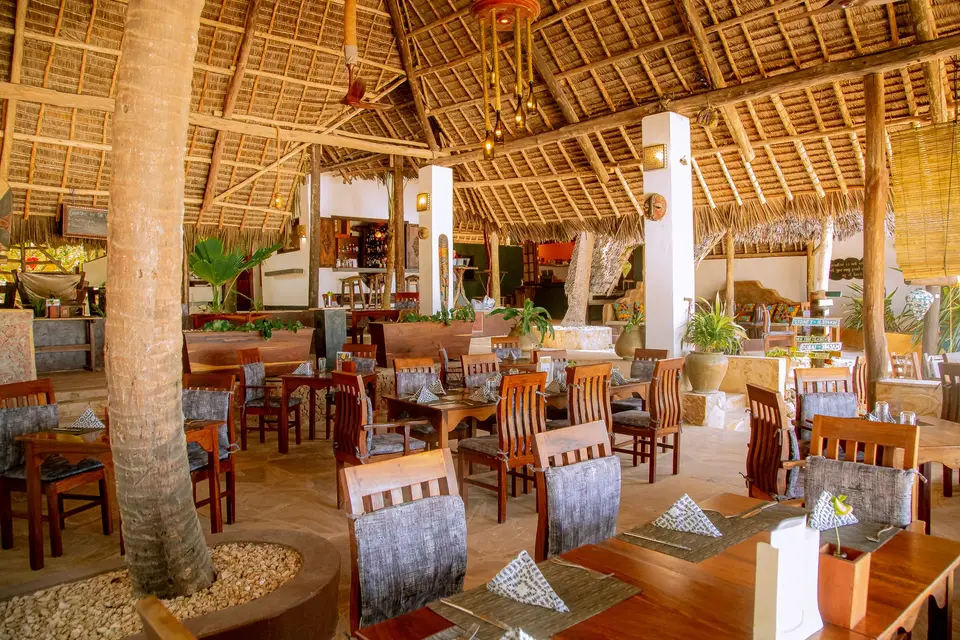 Zatiny Restaurant area at Boutique Hotel Matlai Zanzibar with beachfront dining setup.